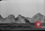 Image of buildings burn China, 1945, second 22 stock footage video 65675071924