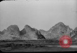 Image of buildings burn China, 1945, second 23 stock footage video 65675071924
