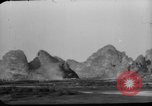 Image of buildings burn China, 1945, second 24 stock footage video 65675071924