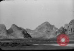 Image of buildings burn China, 1945, second 25 stock footage video 65675071924