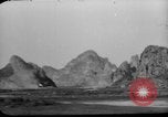 Image of buildings burn China, 1945, second 26 stock footage video 65675071924