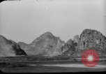 Image of buildings burn China, 1945, second 27 stock footage video 65675071924