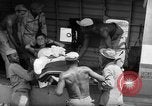 Image of Injured  U.S.prisoners of war removed from air evacuation planes Leyte Philippines, 1945, second 25 stock footage video 65675071949