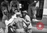 Image of Injured  U.S.prisoners of war removed from air evacuation planes Leyte Philippines, 1945, second 27 stock footage video 65675071949