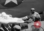 Image of Injured  U.S.prisoners of war removed from air evacuation planes Leyte Philippines, 1945, second 34 stock footage video 65675071949
