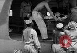 Image of Injured  U.S.prisoners of war removed from air evacuation planes Leyte Philippines, 1945, second 46 stock footage video 65675071949