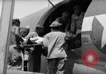 Image of Injured  U.S.prisoners of war removed from air evacuation planes Leyte Philippines, 1945, second 55 stock footage video 65675071949
