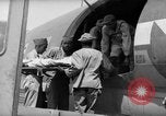 Image of Injured  U.S.prisoners of war removed from air evacuation planes Leyte Philippines, 1945, second 56 stock footage video 65675071949
