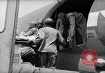 Image of Injured  U.S.prisoners of war removed from air evacuation planes Leyte Philippines, 1945, second 57 stock footage video 65675071949