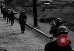 Image of Elements of the U.S. 1st Cavalry Division advancing  Manila Philippines, 1945, second 7 stock footage video 65675071952