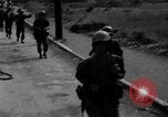 Image of Elements of the U.S. 1st Cavalry Division advancing  Manila Philippines, 1945, second 9 stock footage video 65675071952