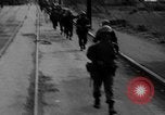 Image of Elements of the U.S. 1st Cavalry Division advancing  Manila Philippines, 1945, second 14 stock footage video 65675071952