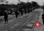Image of Elements of the U.S. 1st Cavalry Division advancing  Manila Philippines, 1945, second 17 stock footage video 65675071952