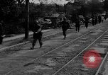 Image of Elements of the U.S. 1st Cavalry Division advancing  Manila Philippines, 1945, second 18 stock footage video 65675071952