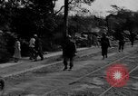 Image of Elements of the U.S. 1st Cavalry Division advancing  Manila Philippines, 1945, second 19 stock footage video 65675071952