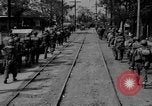 Image of Elements of the U.S. 1st Cavalry Division advancing  Manila Philippines, 1945, second 20 stock footage video 65675071952