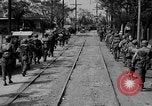 Image of Elements of the U.S. 1st Cavalry Division advancing  Manila Philippines, 1945, second 22 stock footage video 65675071952