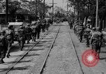 Image of Elements of the U.S. 1st Cavalry Division advancing  Manila Philippines, 1945, second 23 stock footage video 65675071952