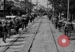 Image of Elements of the U.S. 1st Cavalry Division advancing  Manila Philippines, 1945, second 24 stock footage video 65675071952