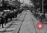 Image of Elements of the U.S. 1st Cavalry Division advancing  Manila Philippines, 1945, second 25 stock footage video 65675071952