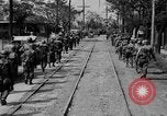 Image of Elements of the U.S. 1st Cavalry Division advancing  Manila Philippines, 1945, second 26 stock footage video 65675071952