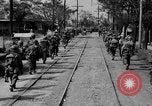 Image of Elements of the U.S. 1st Cavalry Division advancing  Manila Philippines, 1945, second 27 stock footage video 65675071952