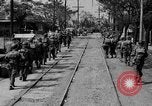 Image of Elements of the U.S. 1st Cavalry Division advancing  Manila Philippines, 1945, second 29 stock footage video 65675071952