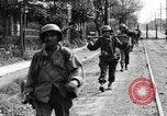 Image of Elements of the U.S. 1st Cavalry Division advancing  Manila Philippines, 1945, second 30 stock footage video 65675071952