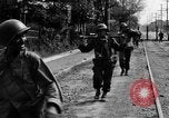 Image of Elements of the U.S. 1st Cavalry Division advancing  Manila Philippines, 1945, second 31 stock footage video 65675071952