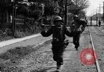 Image of Elements of the U.S. 1st Cavalry Division advancing  Manila Philippines, 1945, second 32 stock footage video 65675071952