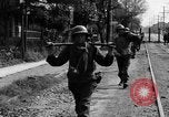Image of Elements of the U.S. 1st Cavalry Division advancing  Manila Philippines, 1945, second 33 stock footage video 65675071952