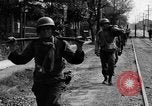 Image of Elements of the U.S. 1st Cavalry Division advancing  Manila Philippines, 1945, second 34 stock footage video 65675071952