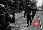 Image of Elements of the U.S. 1st Cavalry Division advancing  Manila Philippines, 1945, second 35 stock footage video 65675071952