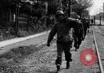Image of Elements of the U.S. 1st Cavalry Division advancing  Manila Philippines, 1945, second 36 stock footage video 65675071952