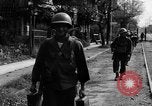 Image of Elements of the U.S. 1st Cavalry Division advancing  Manila Philippines, 1945, second 46 stock footage video 65675071952