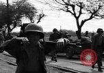 Image of Elements of the U.S. 1st Cavalry Division advancing  Manila Philippines, 1945, second 49 stock footage video 65675071952