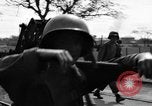 Image of Elements of the U.S. 1st Cavalry Division advancing  Manila Philippines, 1945, second 50 stock footage video 65675071952