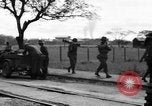 Image of Elements of the U.S. 1st Cavalry Division advancing  Manila Philippines, 1945, second 54 stock footage video 65675071952