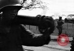Image of Elements of the U.S. 1st Cavalry Division advancing  Manila Philippines, 1945, second 55 stock footage video 65675071952