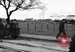 Image of Elements of the U.S. 1st Cavalry Division advancing  Manila Philippines, 1945, second 57 stock footage video 65675071952