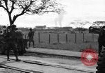 Image of Elements of the U.S. 1st Cavalry Division advancing  Manila Philippines, 1945, second 58 stock footage video 65675071952