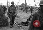 Image of General Mudge and troops of U.S. 1st Cavalry Division Manila Philippines, 1945, second 21 stock footage video 65675071953