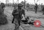 Image of General Mudge and troops of U.S. 1st Cavalry Division Manila Philippines, 1945, second 26 stock footage video 65675071953