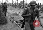 Image of General Mudge and troops of U.S. 1st Cavalry Division Manila Philippines, 1945, second 27 stock footage video 65675071953