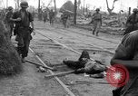 Image of General Mudge and troops of U.S. 1st Cavalry Division Manila Philippines, 1945, second 28 stock footage video 65675071953