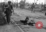 Image of General Mudge and troops of U.S. 1st Cavalry Division Manila Philippines, 1945, second 29 stock footage video 65675071953