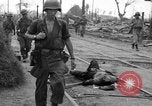 Image of General Mudge and troops of U.S. 1st Cavalry Division Manila Philippines, 1945, second 31 stock footage video 65675071953