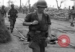 Image of General Mudge and troops of U.S. 1st Cavalry Division Manila Philippines, 1945, second 32 stock footage video 65675071953