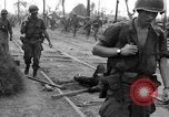 Image of General Mudge and troops of U.S. 1st Cavalry Division Manila Philippines, 1945, second 33 stock footage video 65675071953