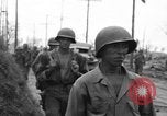 Image of General Mudge and troops of U.S. 1st Cavalry Division Manila Philippines, 1945, second 34 stock footage video 65675071953